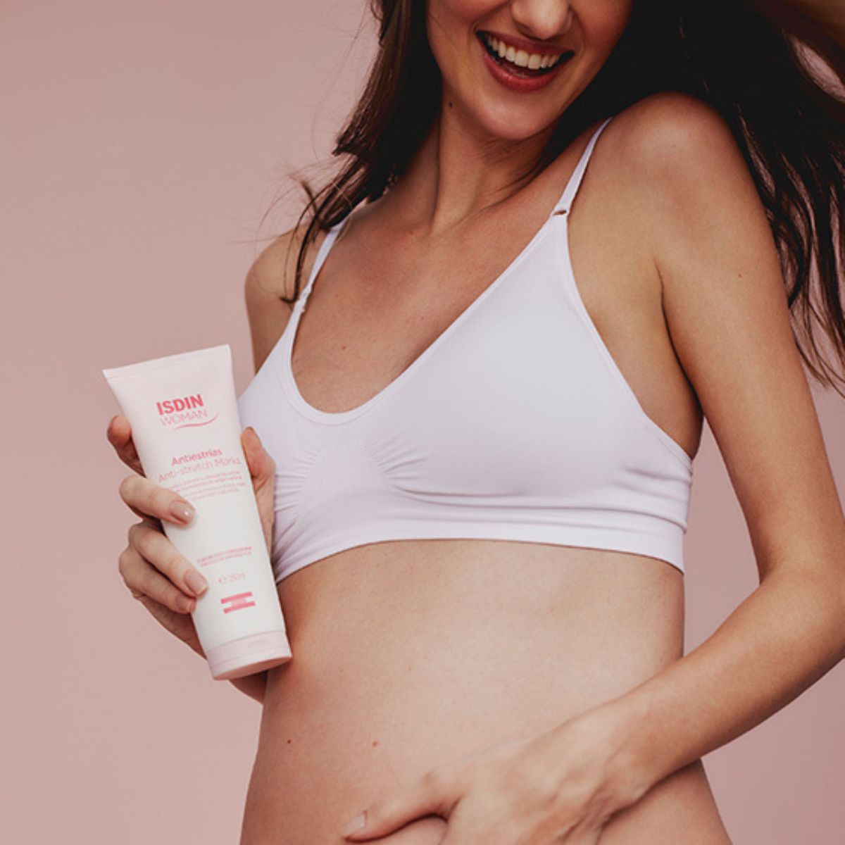 Pregnant woman using  ISDIN Woman Isdin Anti-Stretch Marks 2x250ml