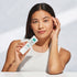 Woman applying Martiderm The Originals Proteos Screen SPF50+ 40ml